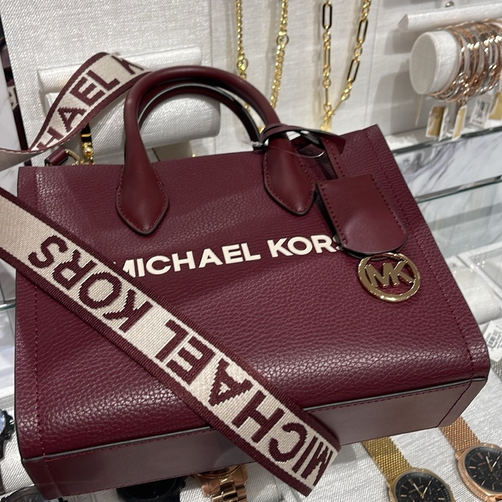Michael Kors Mirella Small Pebbled Leather Crossbody Bag
Oxblood 
NWT - Picture 12 of 16